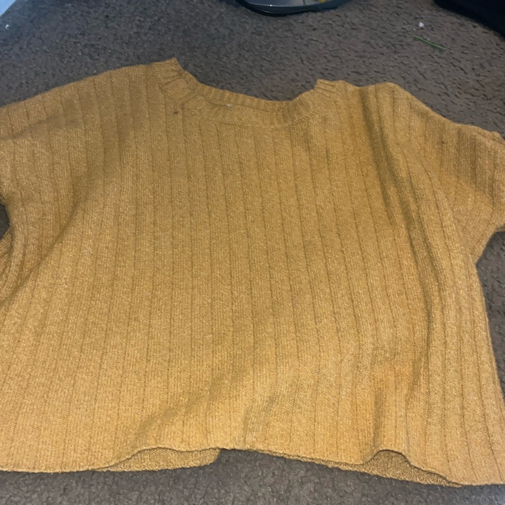 yellow knitted sweater